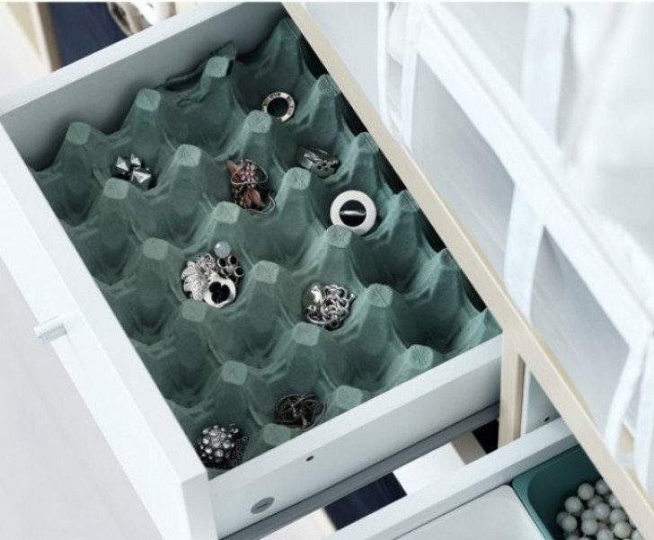 An upcycled egg carton is where you can store your rings and earrings.