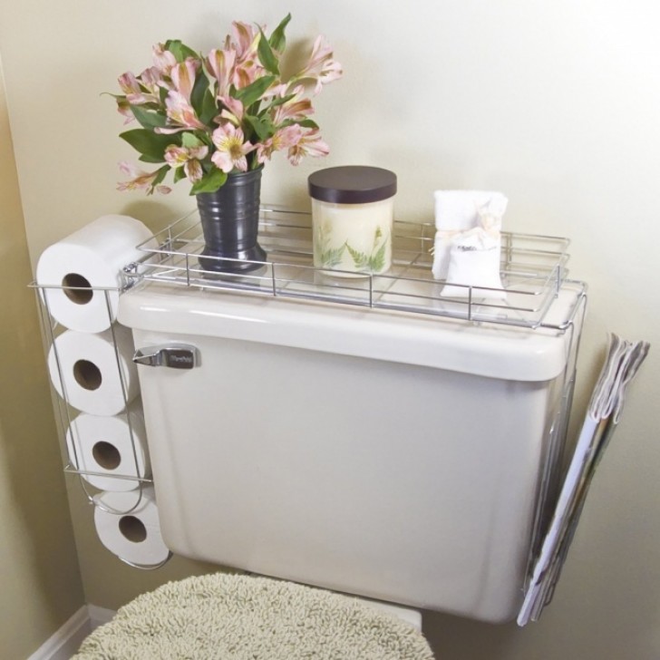 A wire tray on the top of the toilet water tank can hold everything you need.