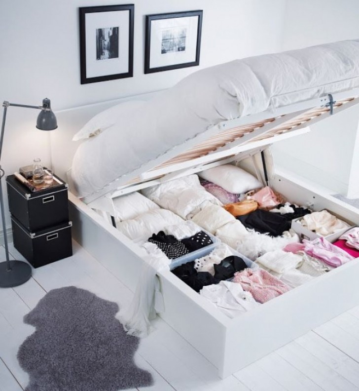 Is the storage bed container full of clothes that are unorganized? Use boxes and separators to keep things in order longer.