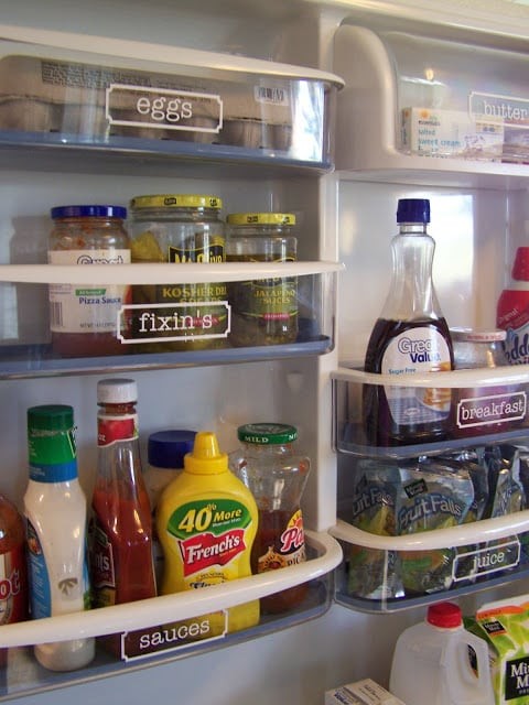 Keep things in order by putting adhesive labels on shelves and trays.