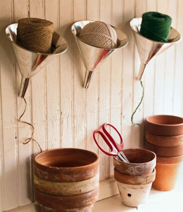 18. Funnels used to hold twine are a good idea to tidy up the cellar!