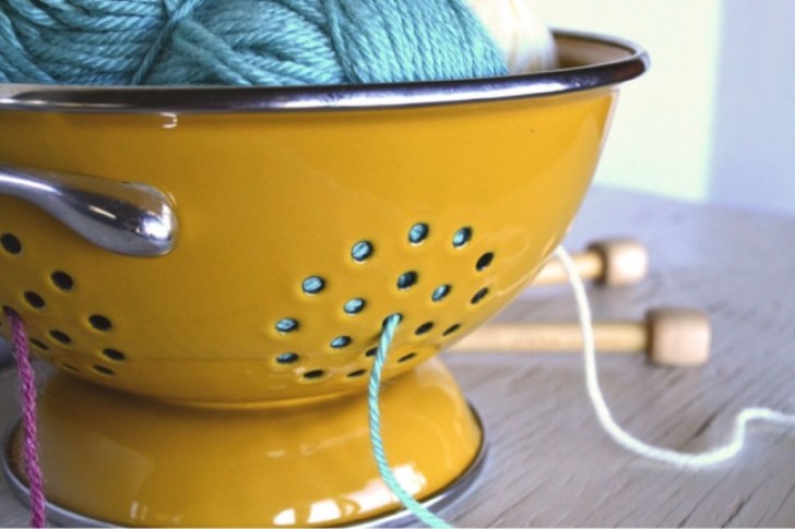 An extra colander can easily become a very convenient container for balls of yarn!