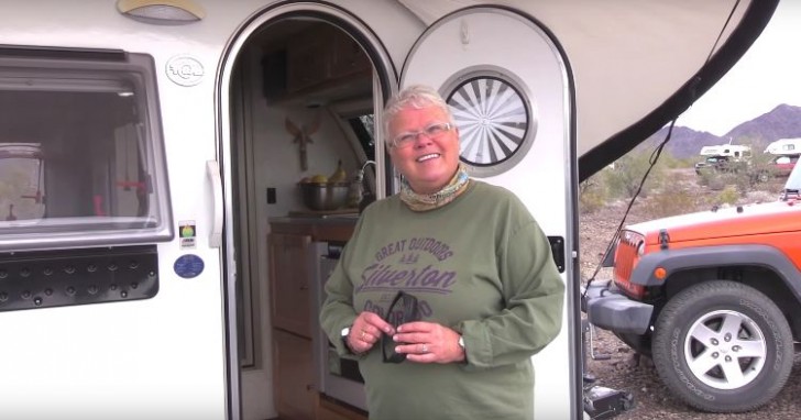 This is Sharon and she lives in a small Teardrop Rv Camper Trailer Model 2015 T @B M@ x S, powered by electricity and solar energy.