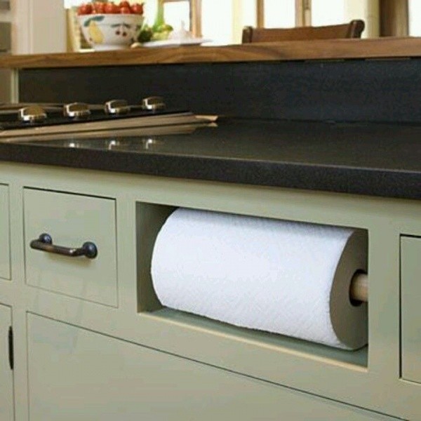 5. If the drawers in your kitchen abound, why not replace one with a very useful paper towel dispenser?