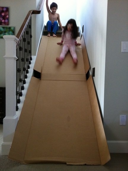  12. A cardboard box slide!