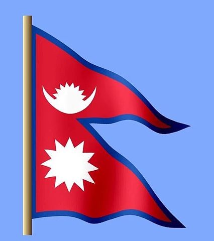 La taille du drapeau du Népal, seul drapeau national à ne pas être quadrilatéral, est établie par la loi : le rectangle qui circonscrit le drapeau a une relation irrationnelle qui est la racine minimale d'un polynôme.