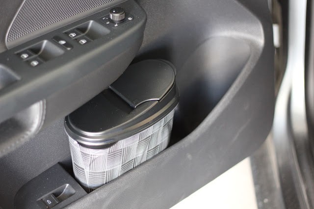 A small trash can is useful for keeping your car clean longer.