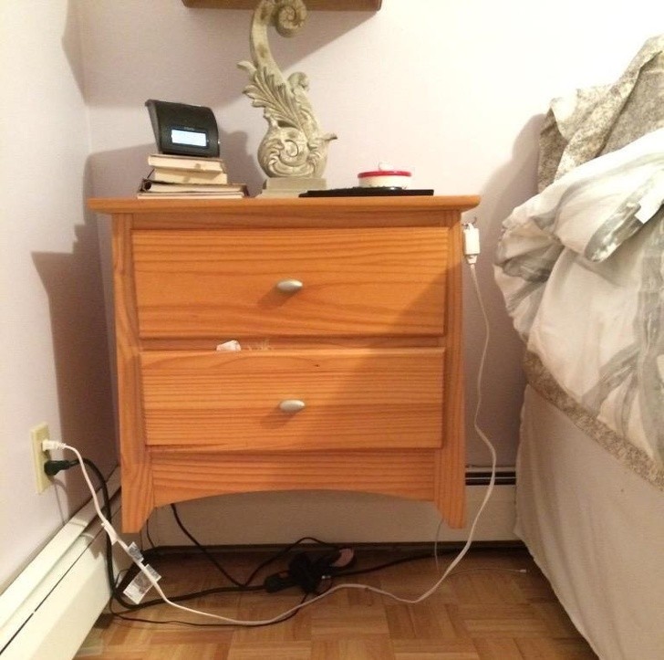 16. The bedside table was too short, so why not just attach it to the wall?