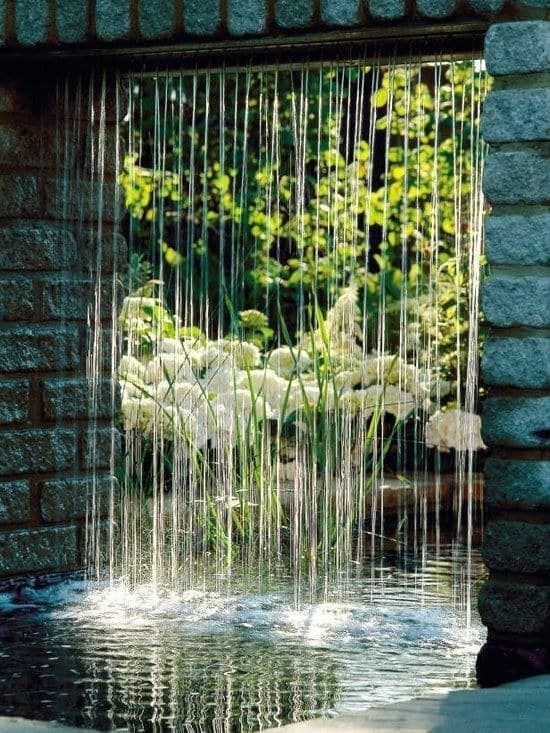 11. Using an archway you can create a truly decorative "rain curtain" waterfall.