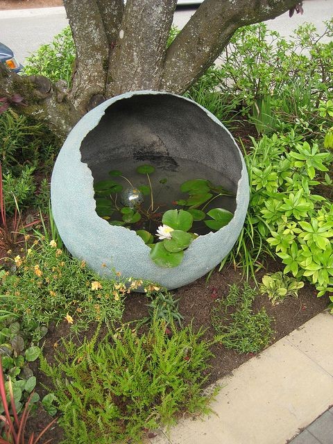 4. Even a small pond can be of great effect - especially if it is enclosed in a broken but still beautiful globe.