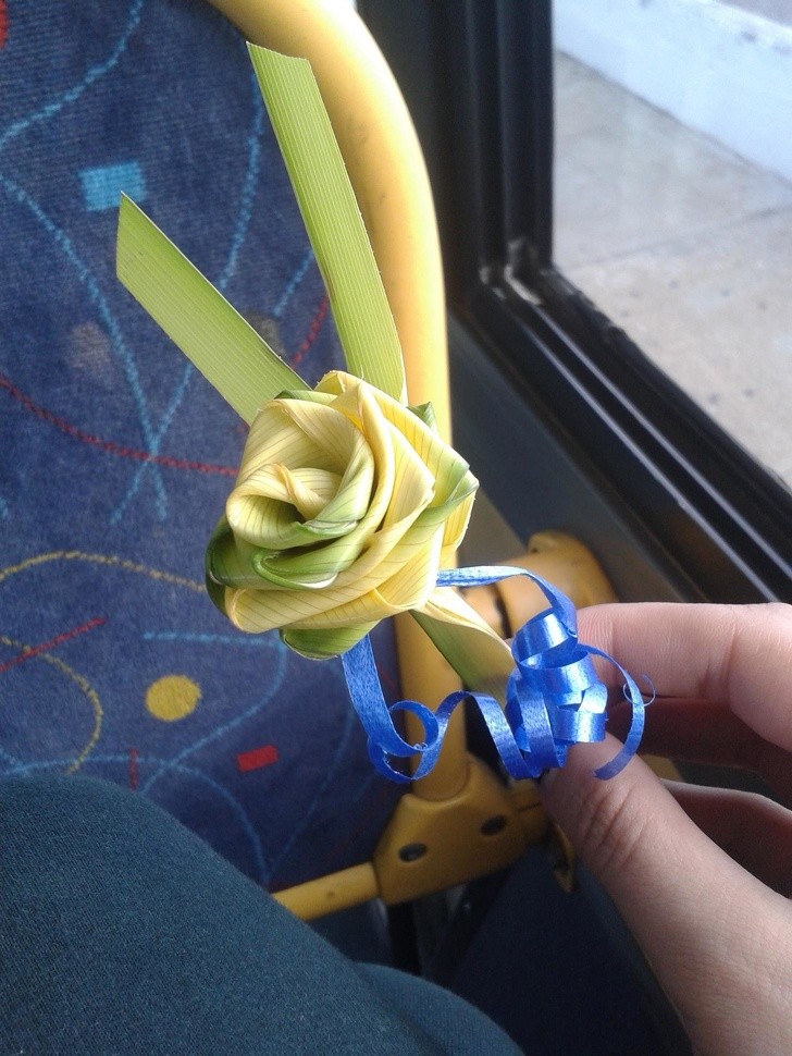 "A very kind gentleman gave me this rose made out of palm tree leaves!"