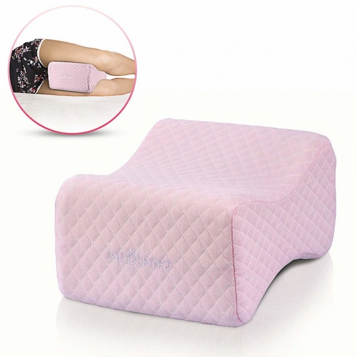 9. Contoured pillow for supporting your legs