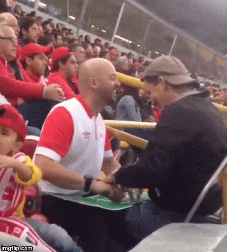 This dad describes the baseball game to his blind son. What a fine example of loving kindness!