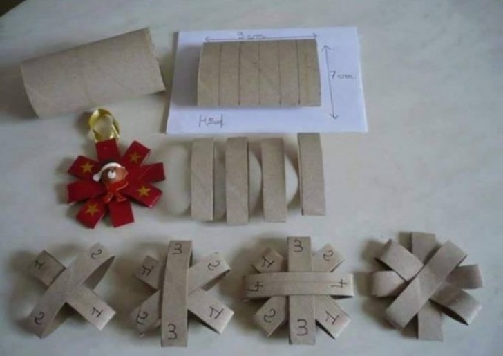 12. Con quattro dischetti ritagliati dai cilindri viene fuori una coccarda ideale per i pacchetti regalo