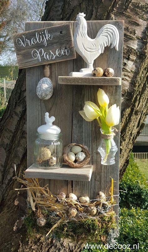 9. Un nido, uova e tulipani per decorare il supporto di legno
