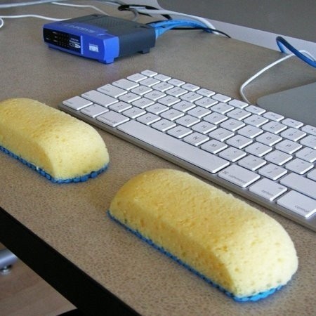 For those who spend lots of time at a computer screen, two kitchen sponges might be the right amount of support your wrists need!