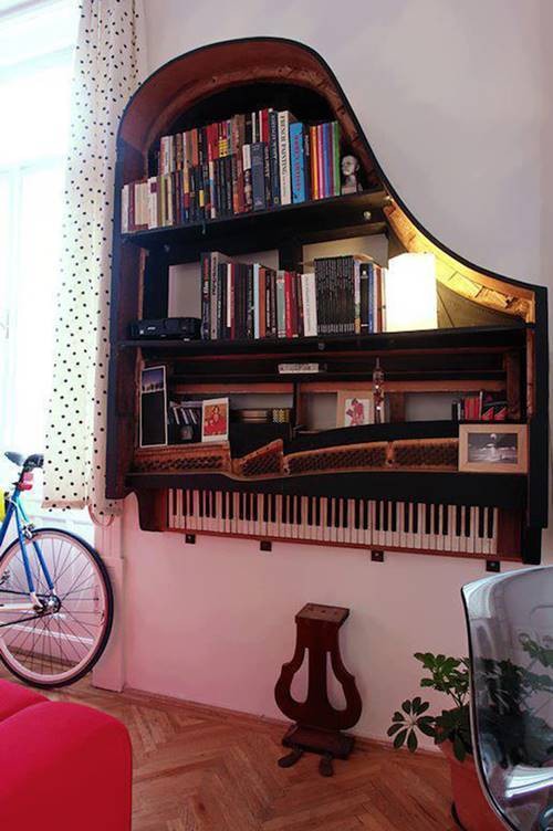 6. C'è chi ha anche convertito un pianoforte a coda in un'incredibile libreria