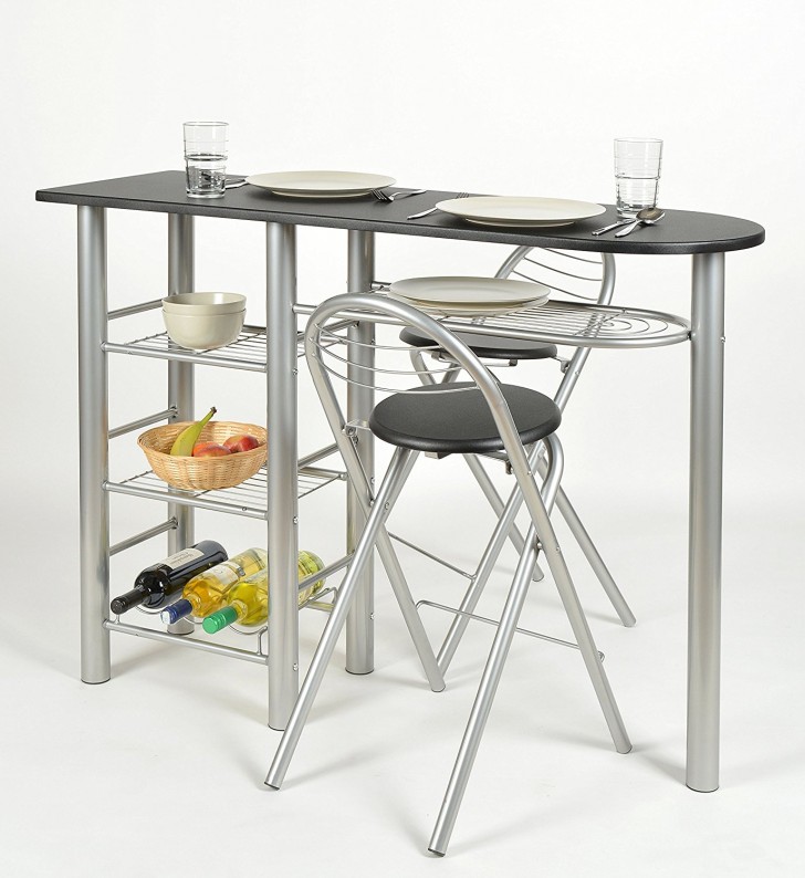 Guardate questo tavolino in acciaio: può anche trasportate bevande e contenere cibo