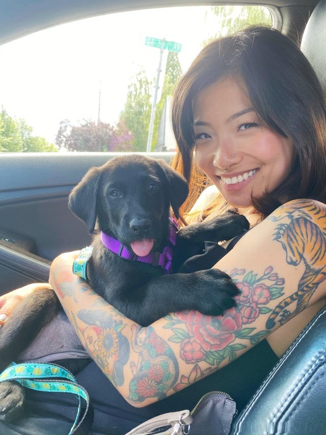 This woman just adopted a pup from an animal shelter... judging from their smiles, they are going to get along just fine. :)