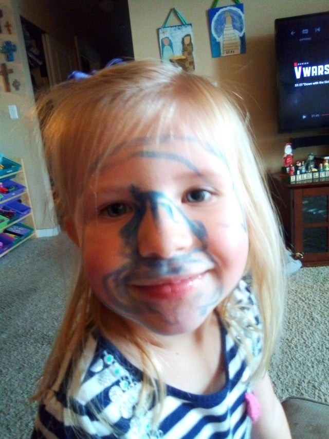She wanted to see if markers could be used as makeup... I guess they can!