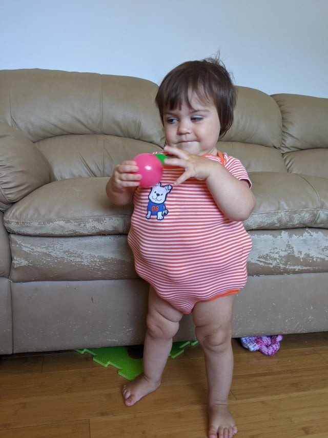 "She kept yelling at me until I put more toy balls in her onesie."