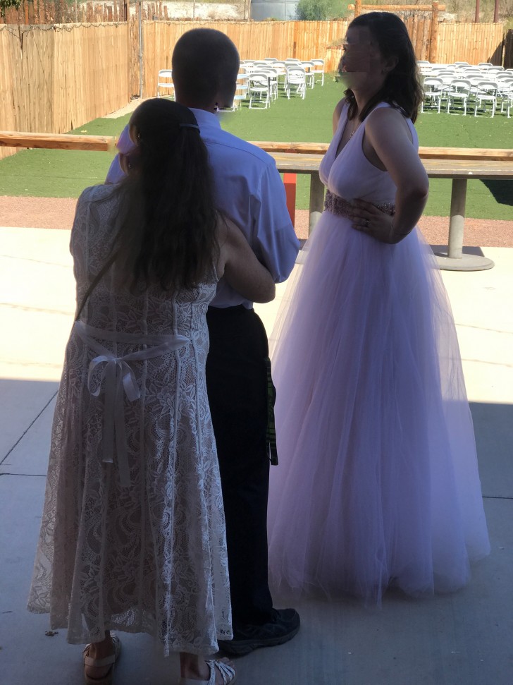 The mother-in-law dresses in a white dress and dances close to her son stealing the show from the bride during the wedding - 2