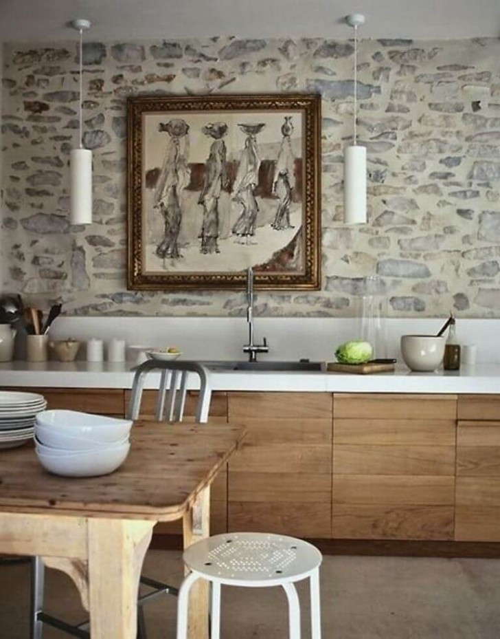 5. La scelta della pietra e la rifinitura in stucco possono rendere questa opzione molto elegante, come in questa cucina