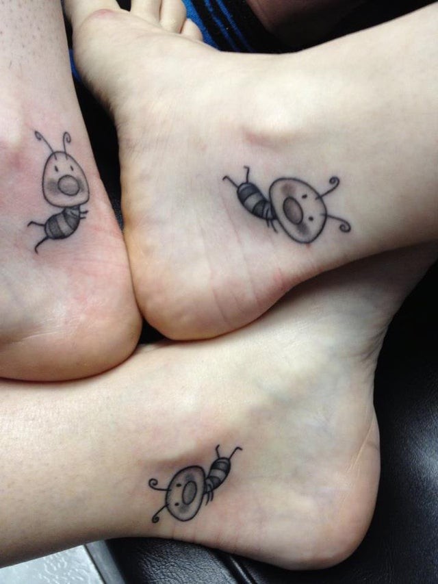 Mom and daughters united forever by a tattoo: three cute, little bees!