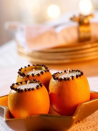 8. Gerecyclede sinaasappelschillen, met de randen versierd met kruidnagels