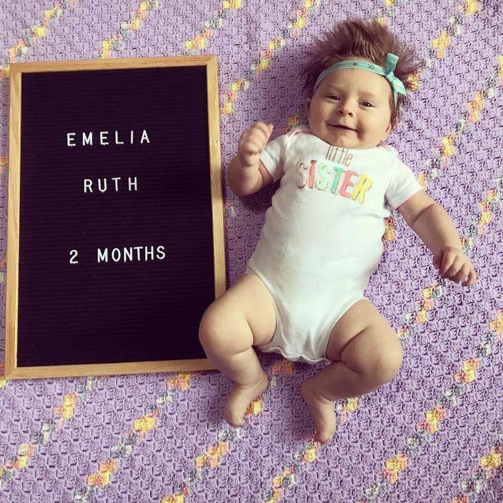 12. Two months old and she already has a lot of hair to comb ...