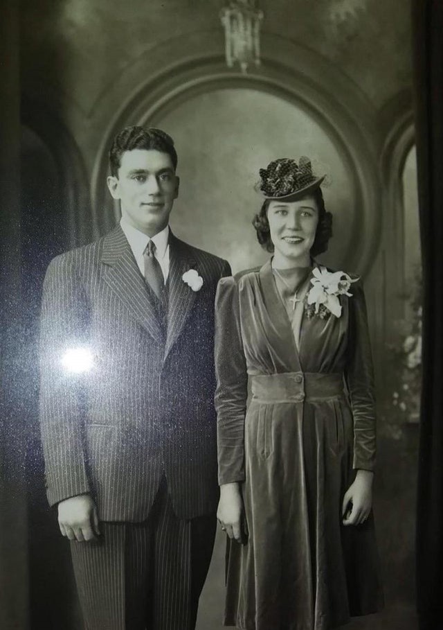16. "My great-grandparents on their wedding day in 1937. They both look very happy, although who knows what color great-grandmother's dress was!"
