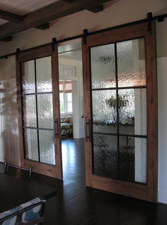 5. Als je toevallig glazen ramen of openslaande deuren hebt die hergebruikt moeten worden, kunnen het perfecte schuifdeuren voor binnen worden