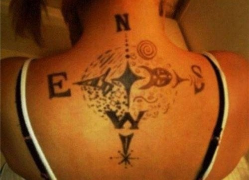 10. Maybe she didn't measure her back to start with, but at the bottom the tattoo seems to have taken a bad turn.