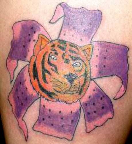 13. What was it supposed to represent? In any case, both the petals and the tiger's face need to be redone.