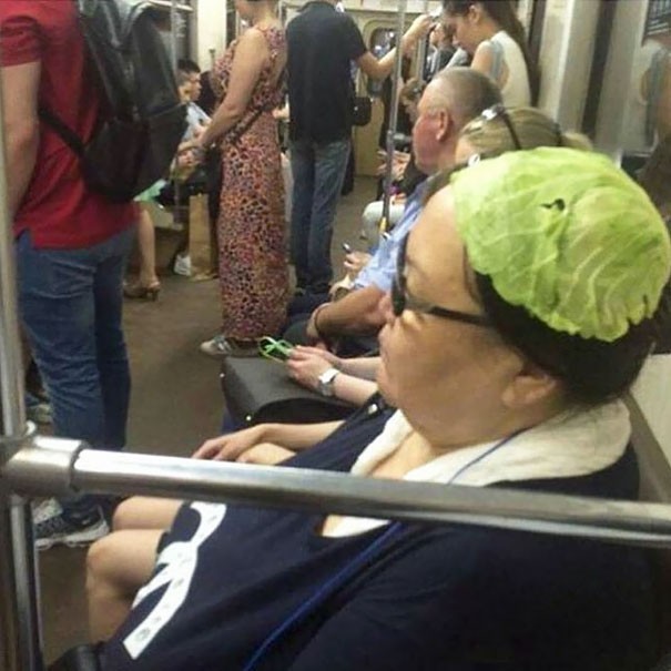 Yes, you have seen correctly: this woman is wearing a lettuce leaf head piece!