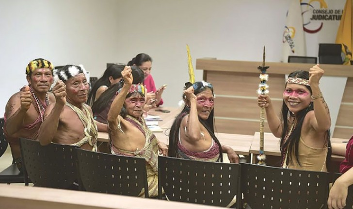 The image of happiness: an Amazon tribe win their case against Big Oil, a colossus that threatened to destroy millions of acres of rainforest!