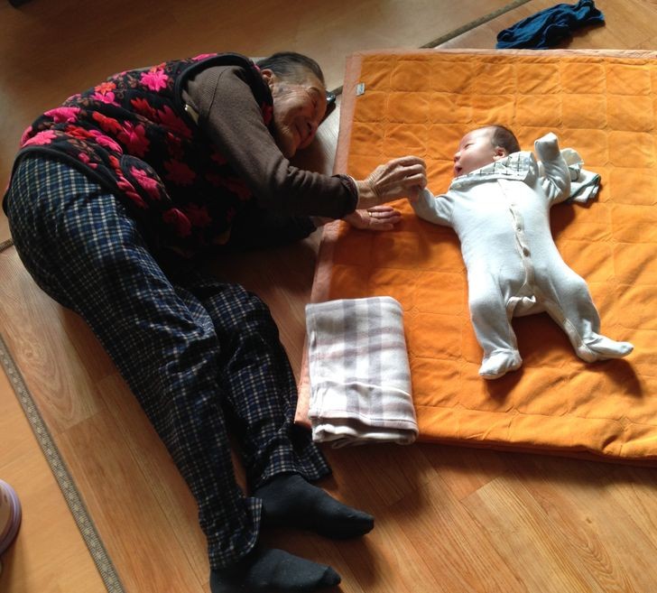 A 97-year-old great-grandfather with his great-grandchild of just 1 month old...how sweet to see the generations together!