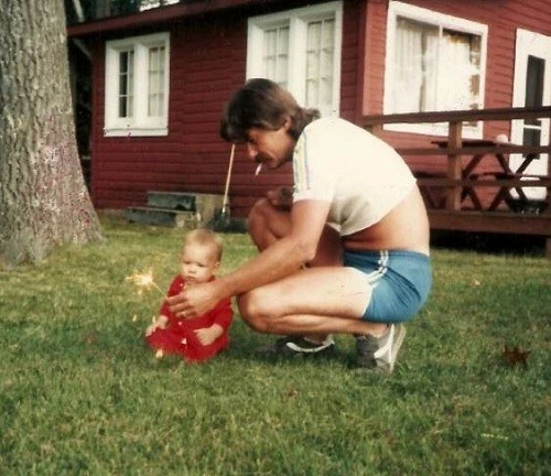11. Playing with the sparklers at a few months old: another parenting masterclass!