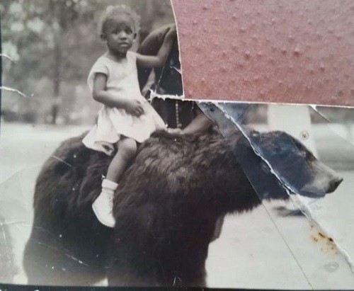13. Apparently they thought it was safe to let her ride a bear ...