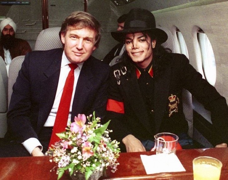 Donald Trump and Michael Jackson taking a picture of themselves on a private jet ...