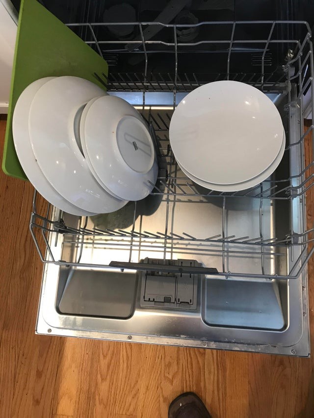 This is how my mother-in-law loads the dishes in the dishwasher ...