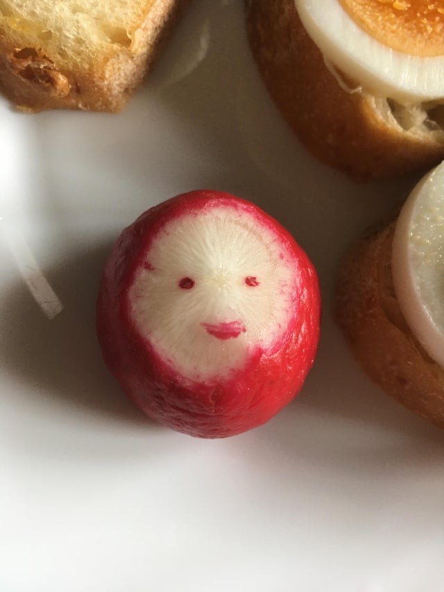 A radish who is rather happy to be chopped ...