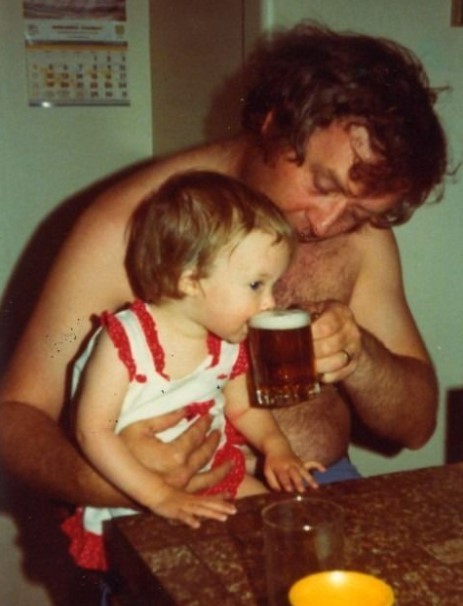 5. A dad giving his daughter a taste of beer