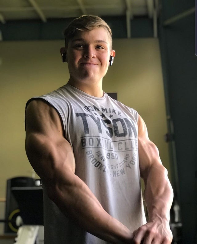 14. This bodybuilder has the face of a 13-year-old boy