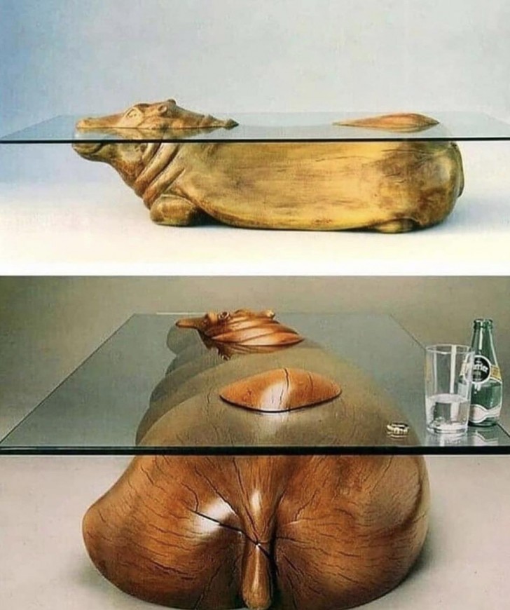 7. Une table en verre avec une base en forme d'hippopotame