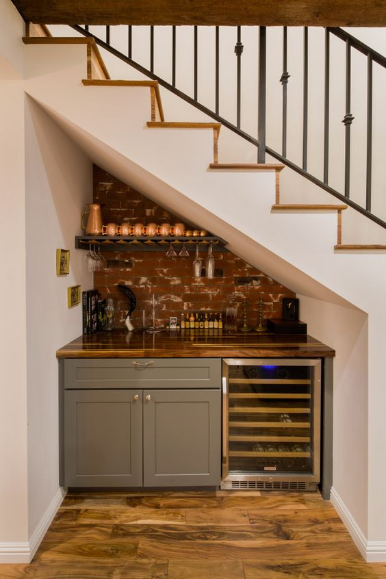 10. A bar under the stairs