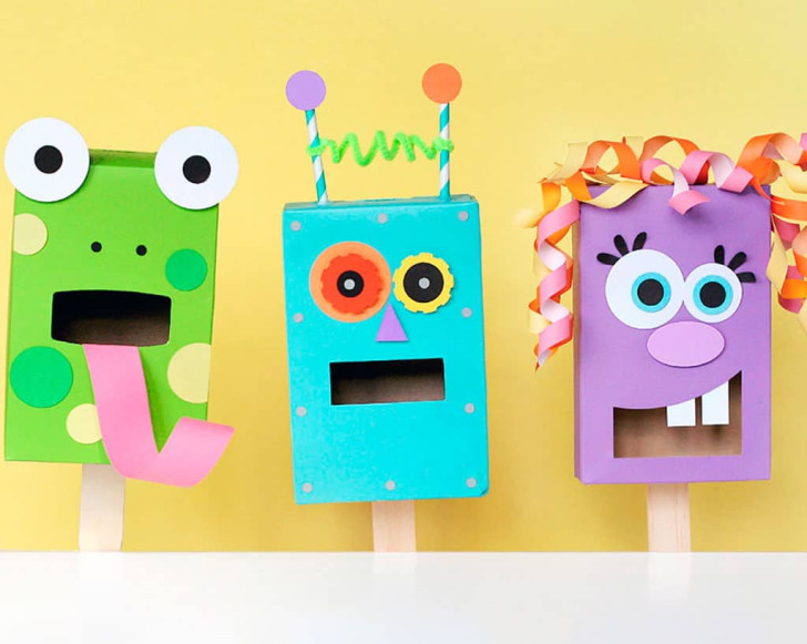 colorful puppets made from empty pasta boxes