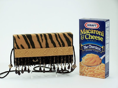 a handbag next to a pasta box