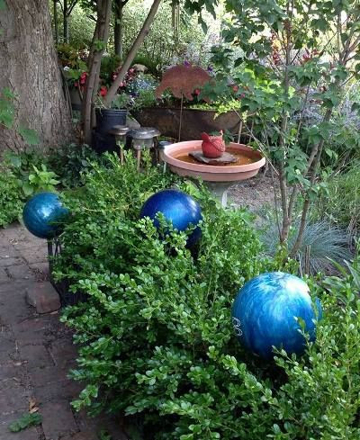5. Decorative orbs using bowling balls