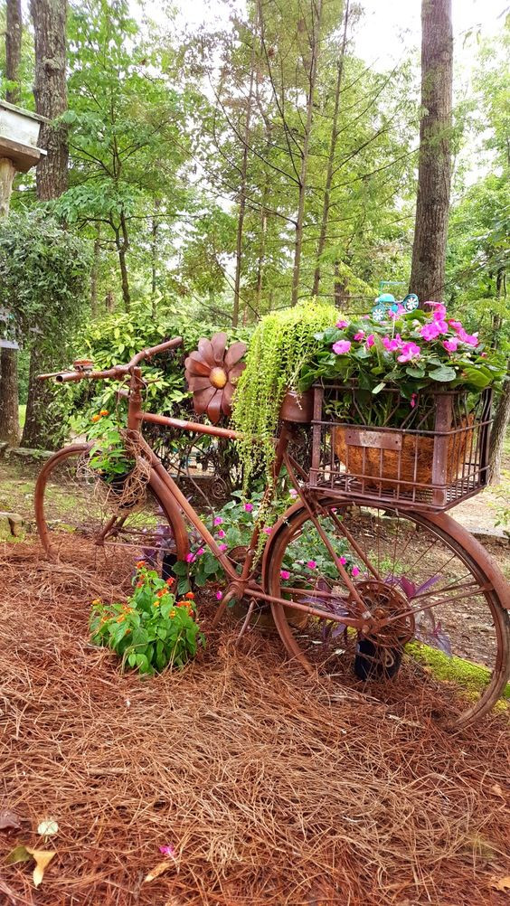 7. Vintage bicycle in the middle of the garden